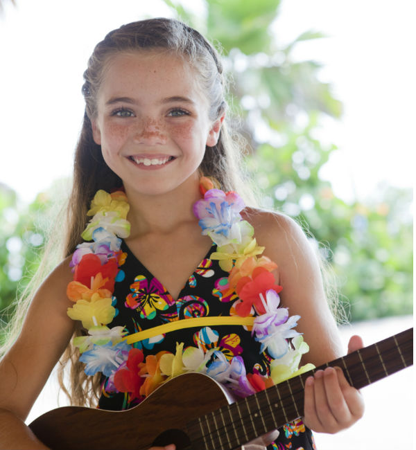 Musik und Tanz auf der Hawaiiparty. • Foto: Pam McLean / Getty Images